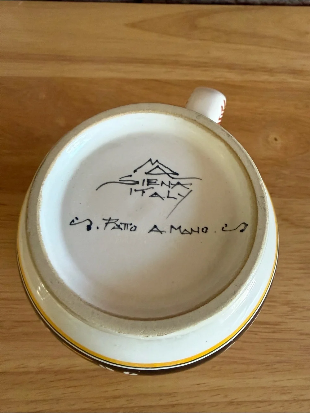 Sienna Italy Hand-Painted Ceramic Mug. Featuring white deer small chip